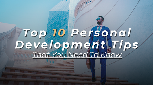 A picture of an african american entrepreneur wearing a nice blue suite with a leather hand bag with a text written 'Top 10 Personal Development Tips That You Need To Know'